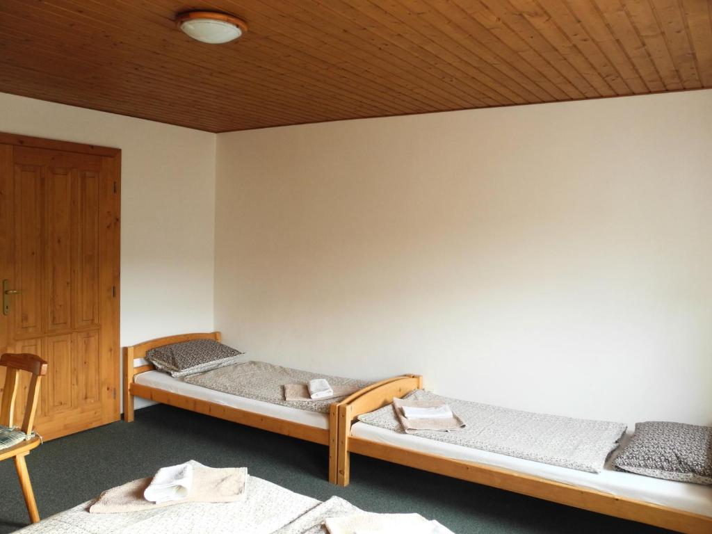 Postel nebo postele na pokoji v ubytování Apartmány Müller
