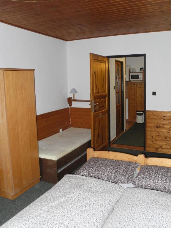 Postel nebo postele na pokoji v ubytování Apartmány Müller