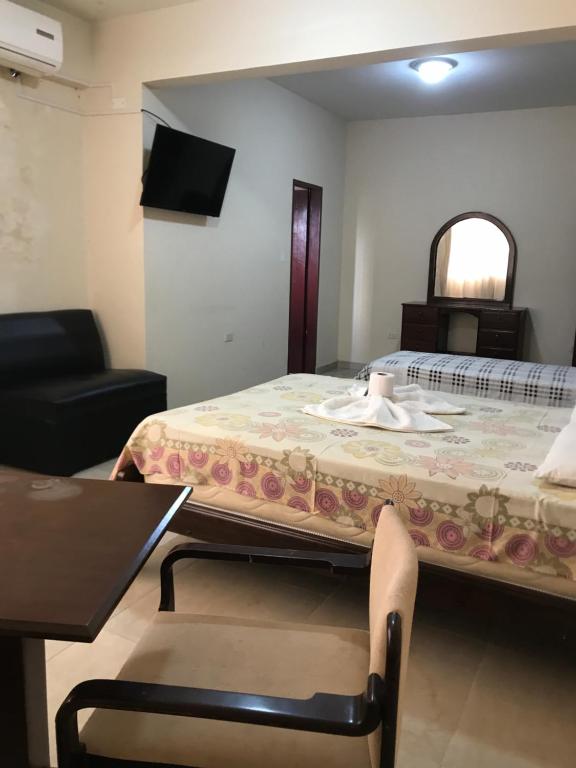 Postel nebo postele na pokoji v ubytování Hotel Viru Viru II