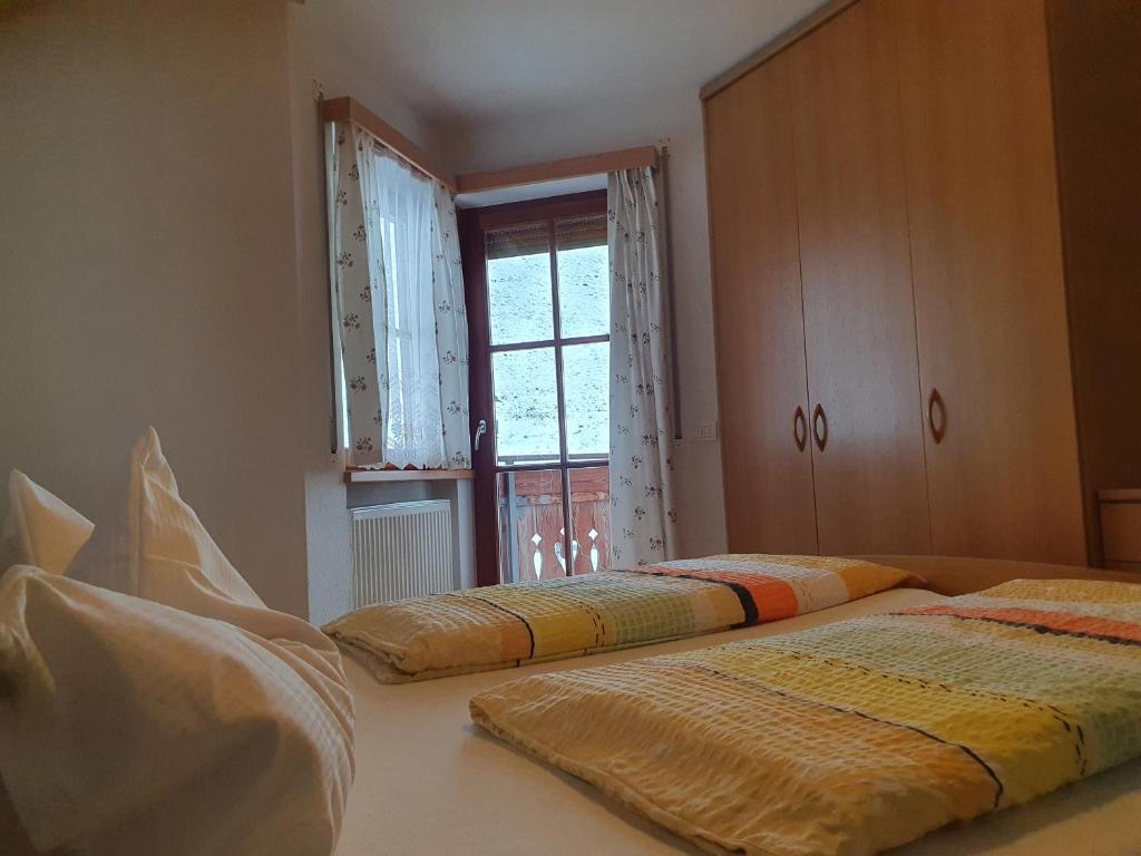 Postel nebo postele na pokoji v ubytování Kramerhof