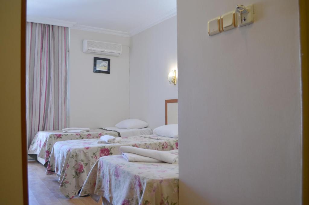 Grand Milano Hotel - Habitación Triple