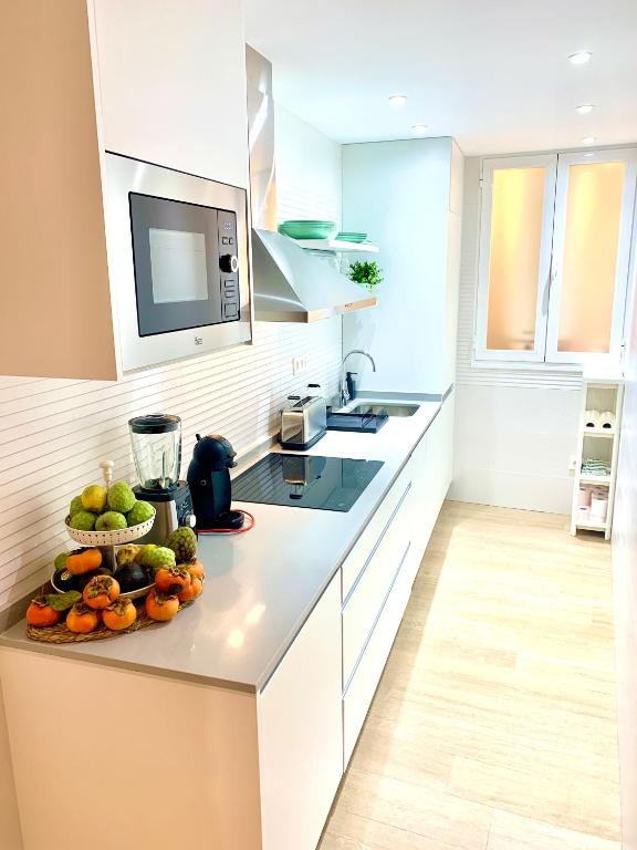 Kuchyň nebo kuchyňský kout v ubytování Sea to Sky Suites - Mijas Pueblo
