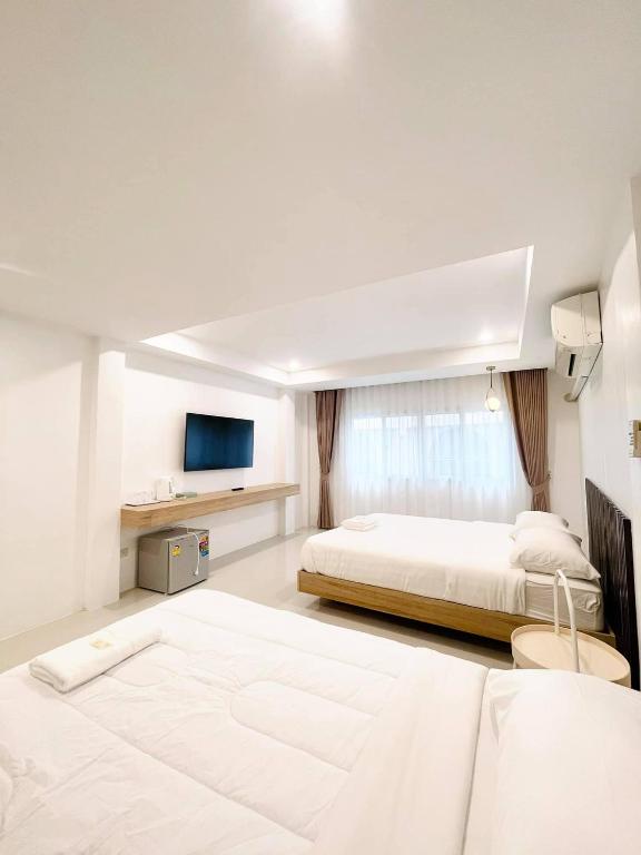 Postel nebo postele na pokoji v ubytování Topnorth Hotel Maesai