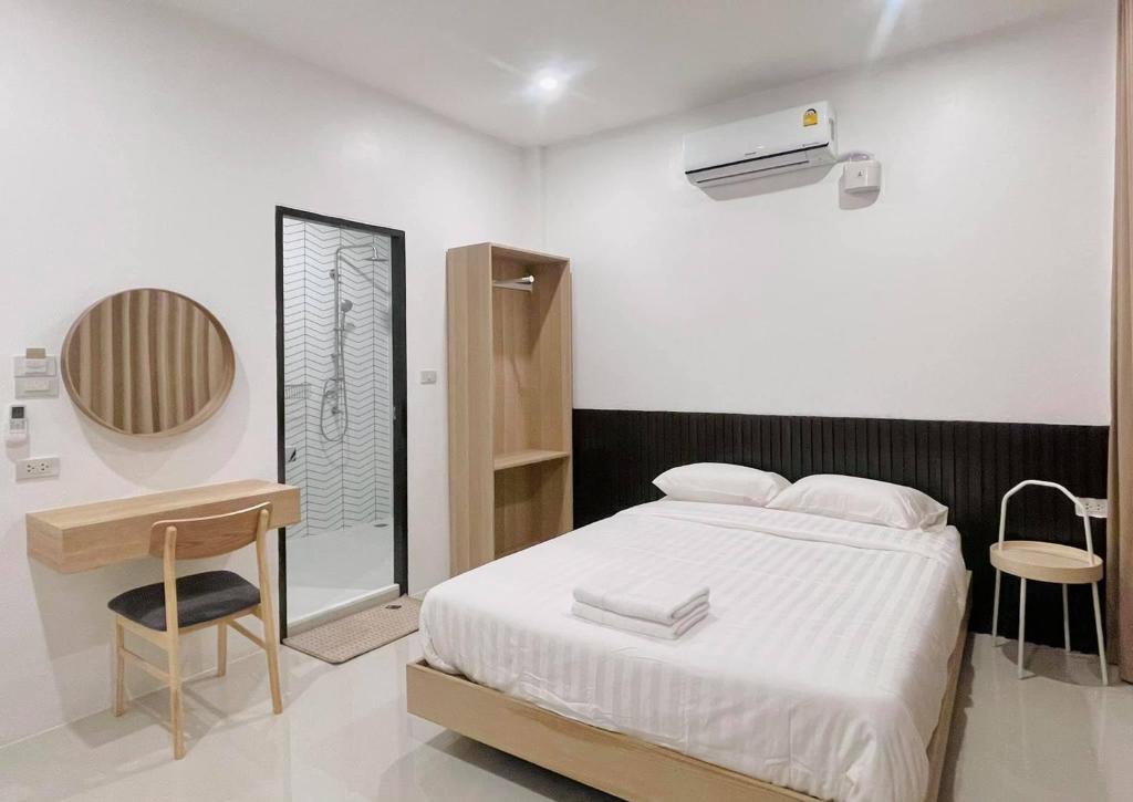 Postel nebo postele na pokoji v ubytování Topnorth Hotel Maesai