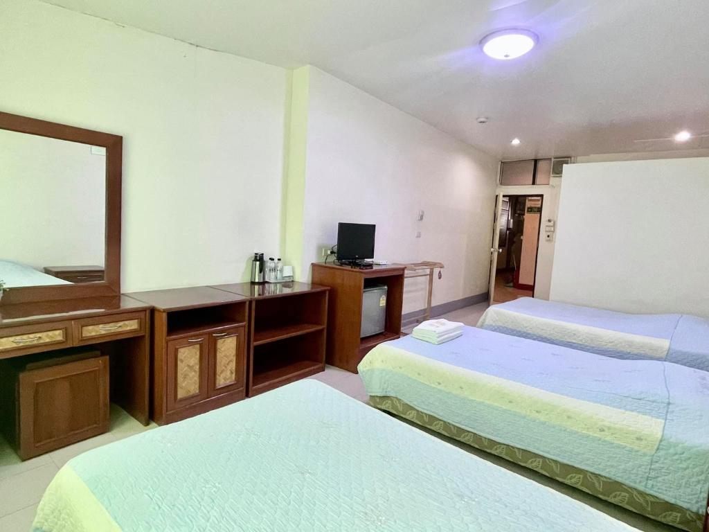 Postel nebo postele na pokoji v ubytování Topnorth Hotel Maesai