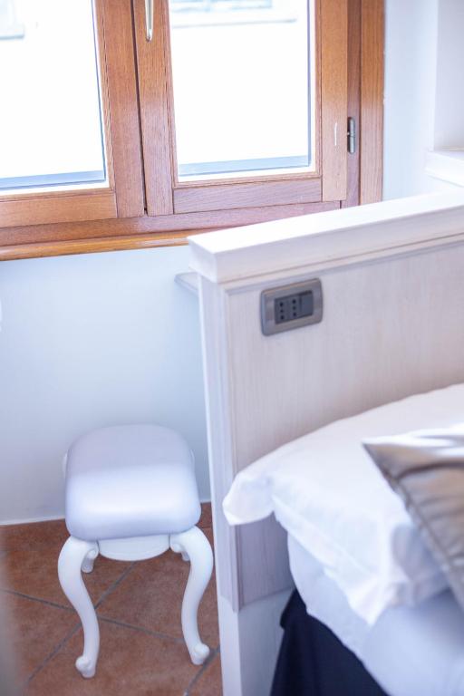 A bed or beds in a room at Residenza Florentia