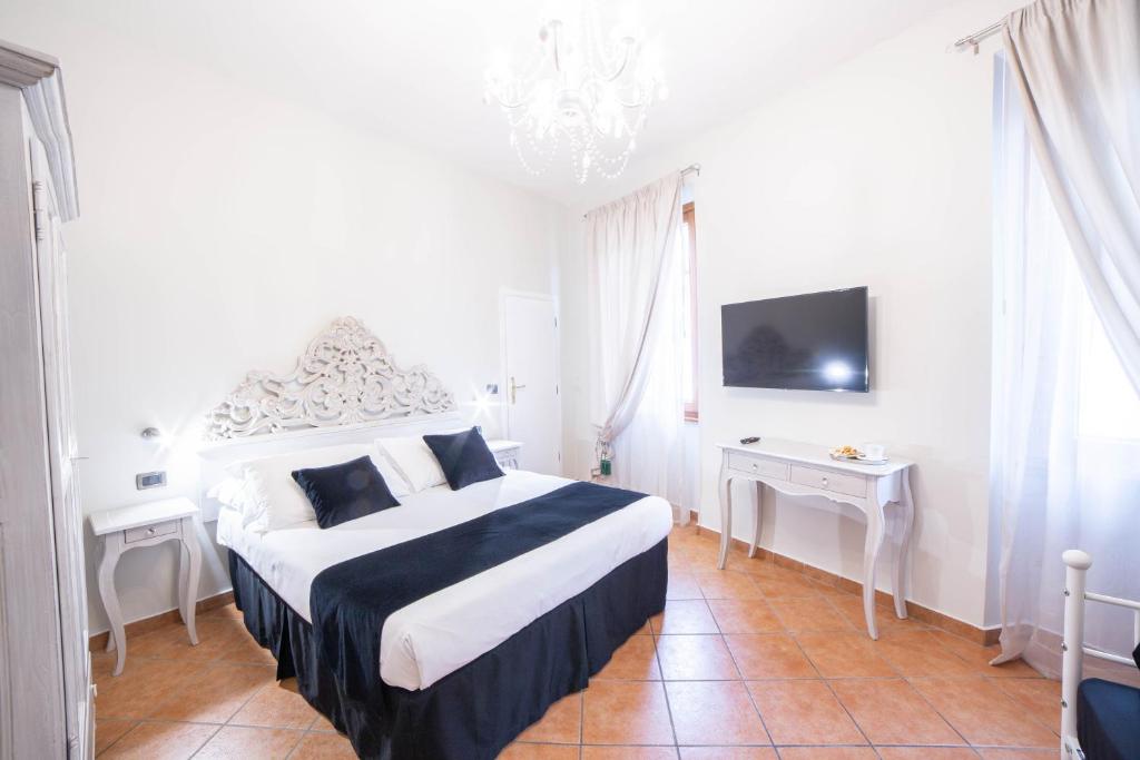 A bed or beds in a room at Residenza Florentia