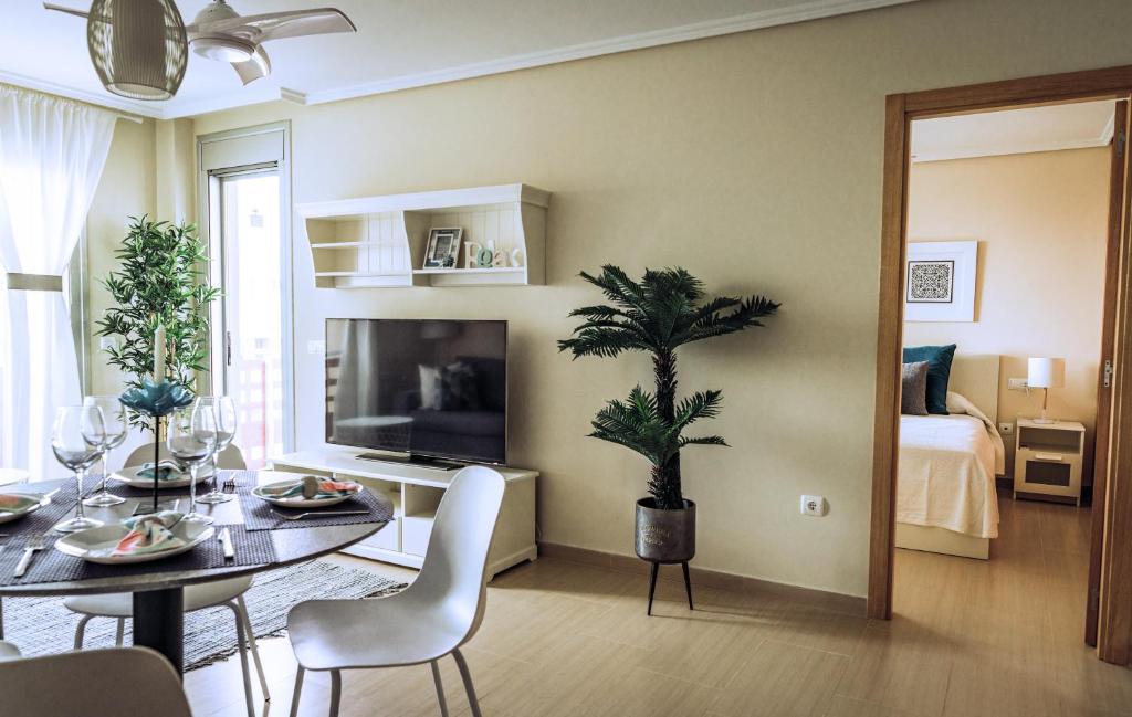 Televízia a/alebo spoločenská miestnosť v ubytovaní Apartamento VISTA ROJA - LA TEJITA