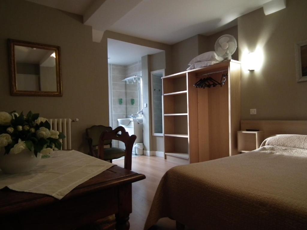Postel nebo postele na pokoji v ubytování hôtel Piellenia