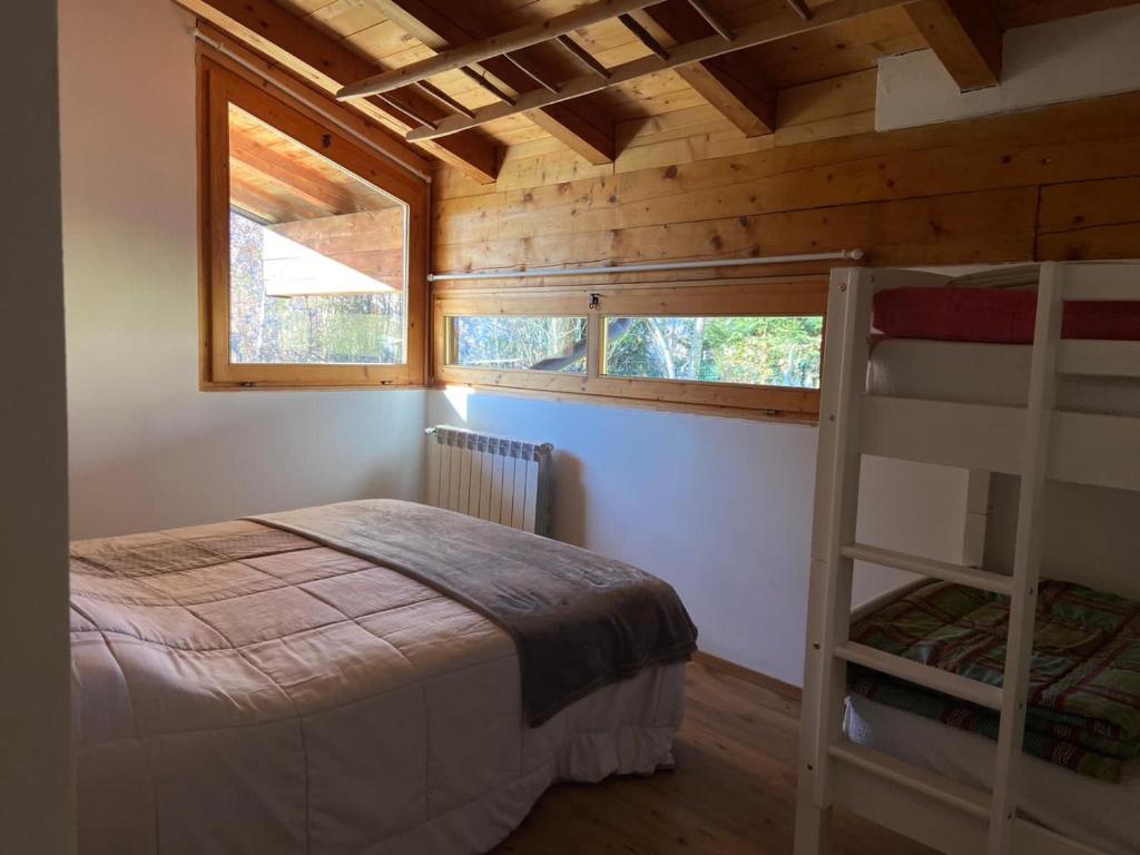 Postel nebo postele na pokoji v ubytování Eco Chalet Nonno Silvano