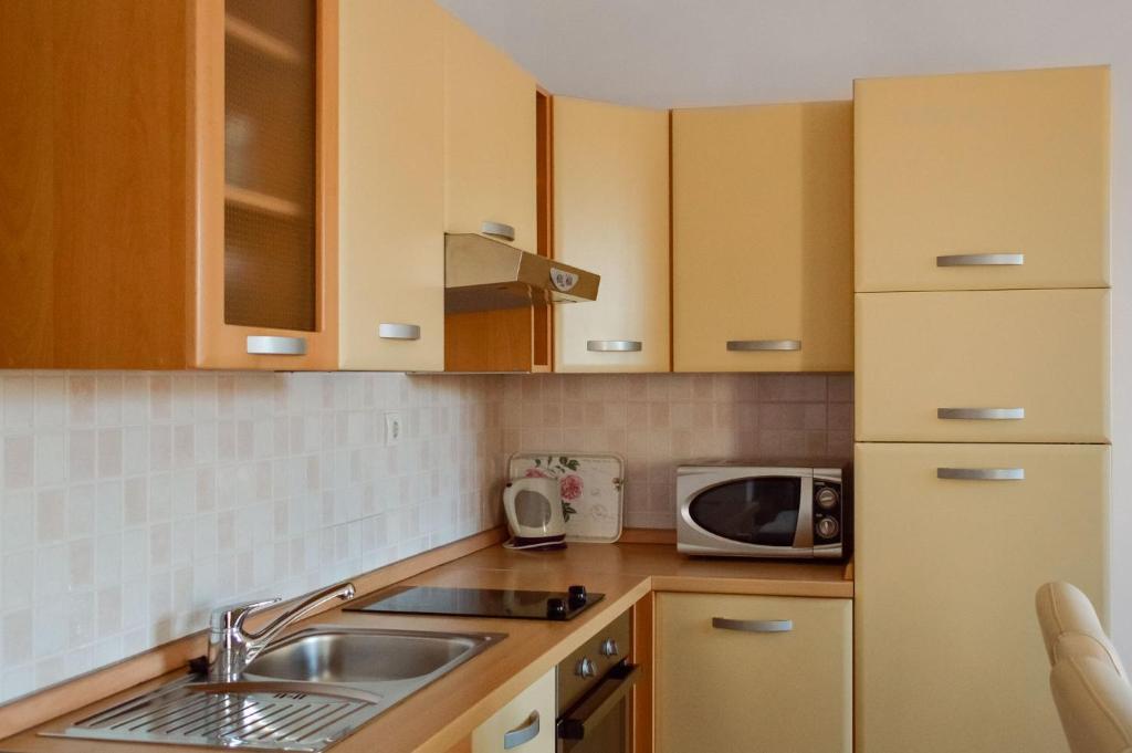 Kuchyňa alebo kuchynka v ubytovaní Apartments Turić