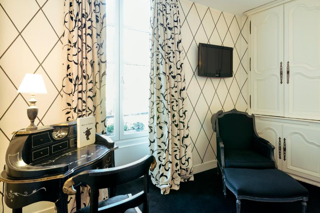Posezení v ubytování Logis - Hôtel & Restaurant du Tribunal