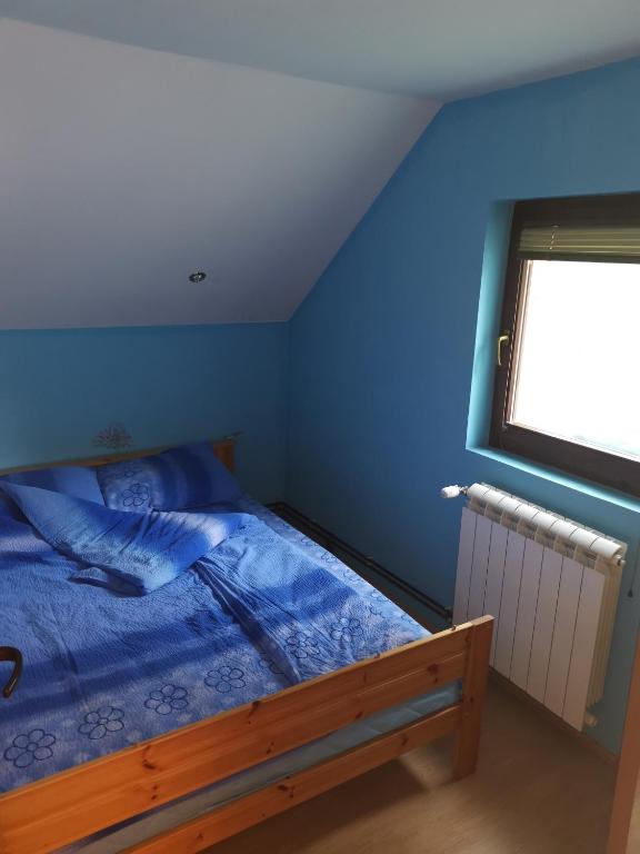 Krevet ili kreveti u jedinici u okviru objekta Apartmani Popovic