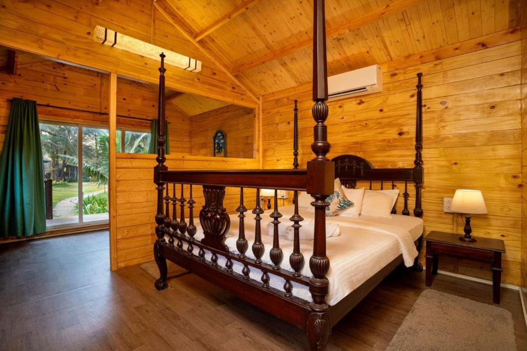 Postel nebo postele na pokoji v ubytování Montego Bay Beach Village - Morjim