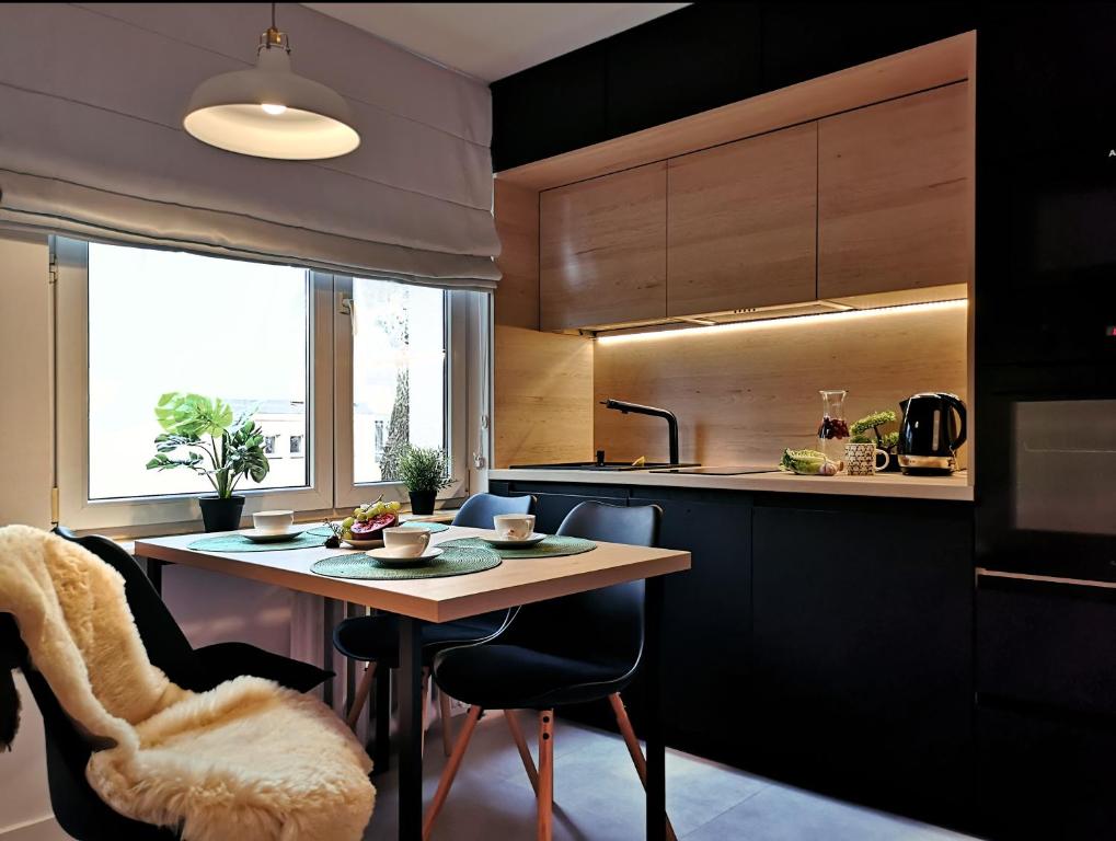 Kuchyňa alebo kuchynka v ubytovaní Apartament Liliowa Przełęcz