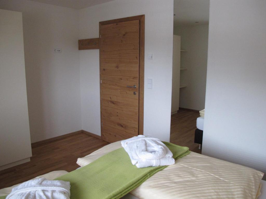 Postel nebo postele na pokoji v ubytování Haus Kibitz