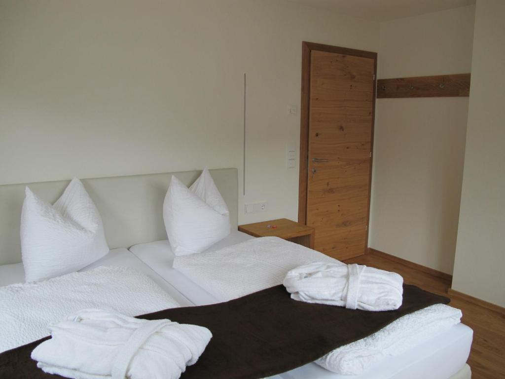 Postel nebo postele na pokoji v ubytování Haus Kibitz