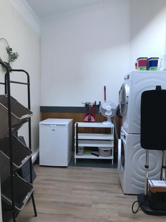 Postel nebo postele na pokoji v ubytování Le petit béguinage