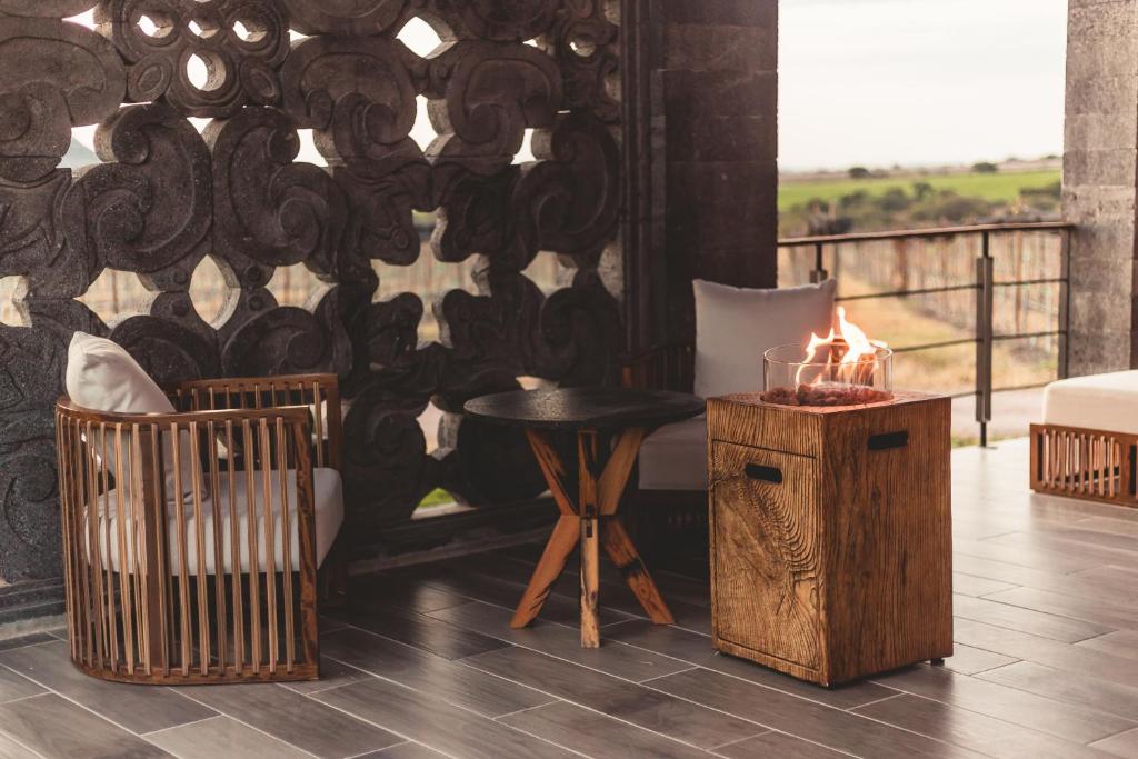 Balkón nebo terasa v ubytování Casa Raíces Hotel Luxury & Viñedo
