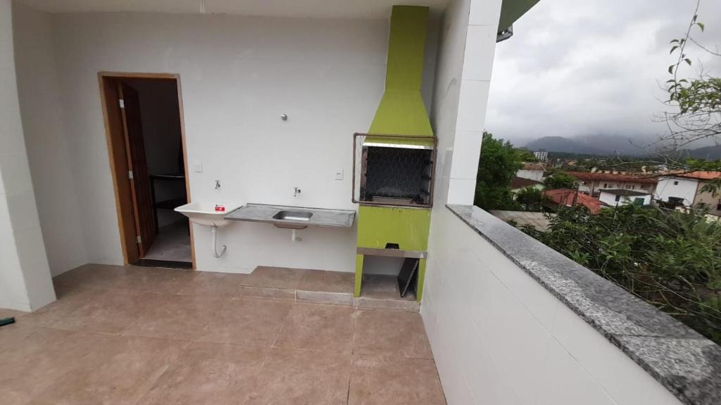  Apartamento duplex novo no Perequê Açu - de frente ao mar