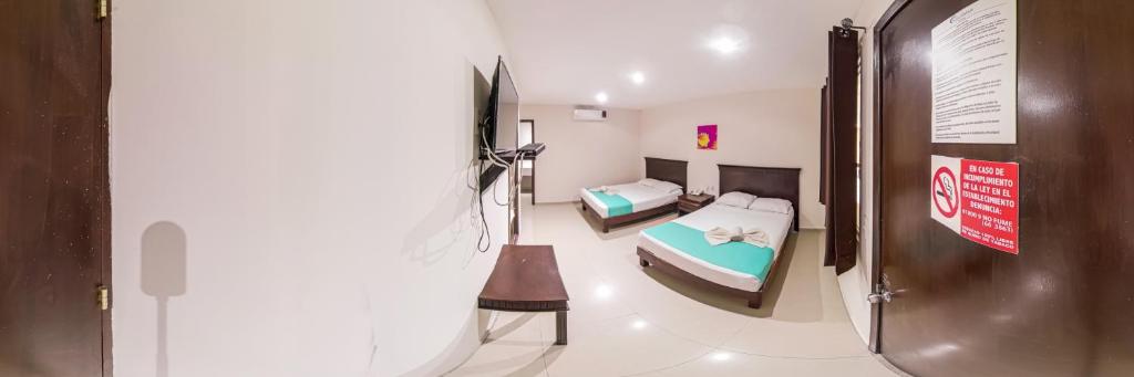 Postel nebo postele na pokoji v ubytování Hotel Villamar