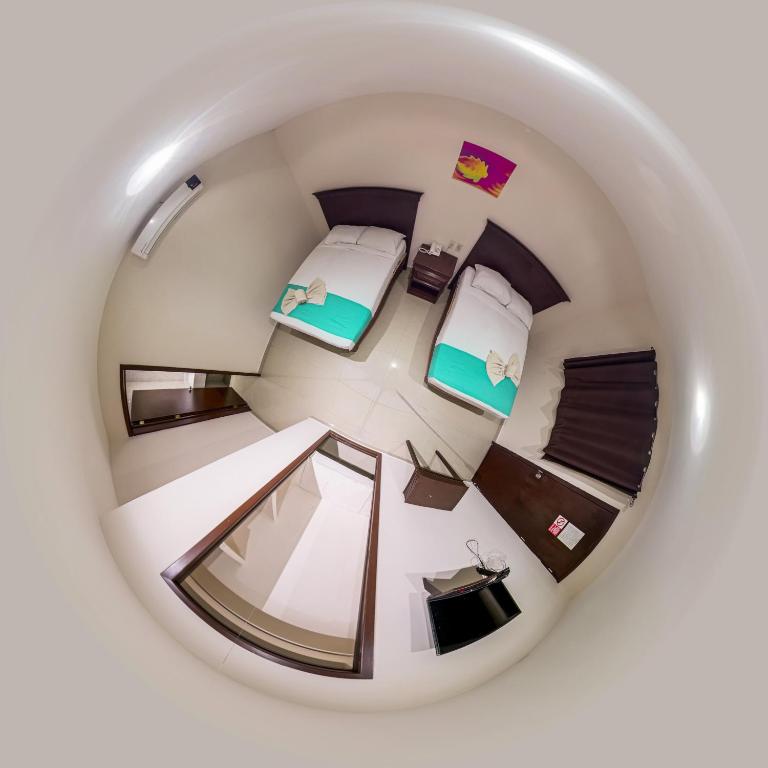 Postel nebo postele na pokoji v ubytování Hotel Villamar