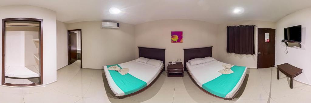Postel nebo postele na pokoji v ubytování Hotel Villamar