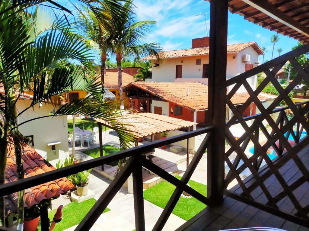una vista desde el balcón de una casa en POUSADA BORE KOKO, en Porto de Galinhas