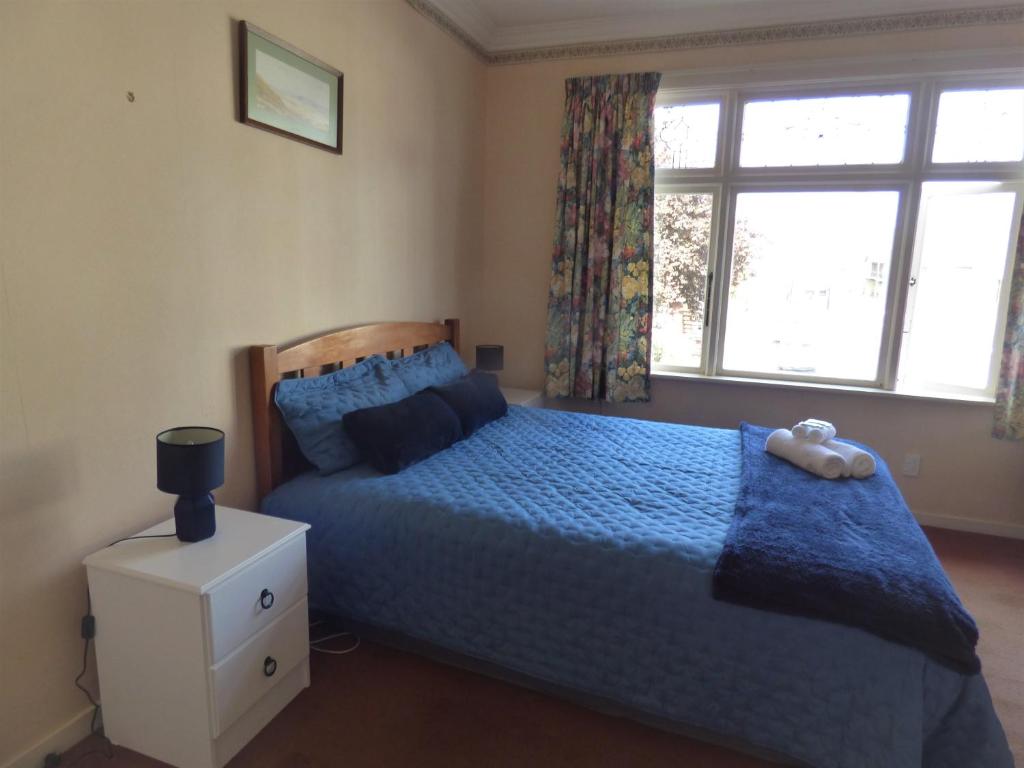 Postel nebo postele na pokoji v ubytování Sahara Motels
