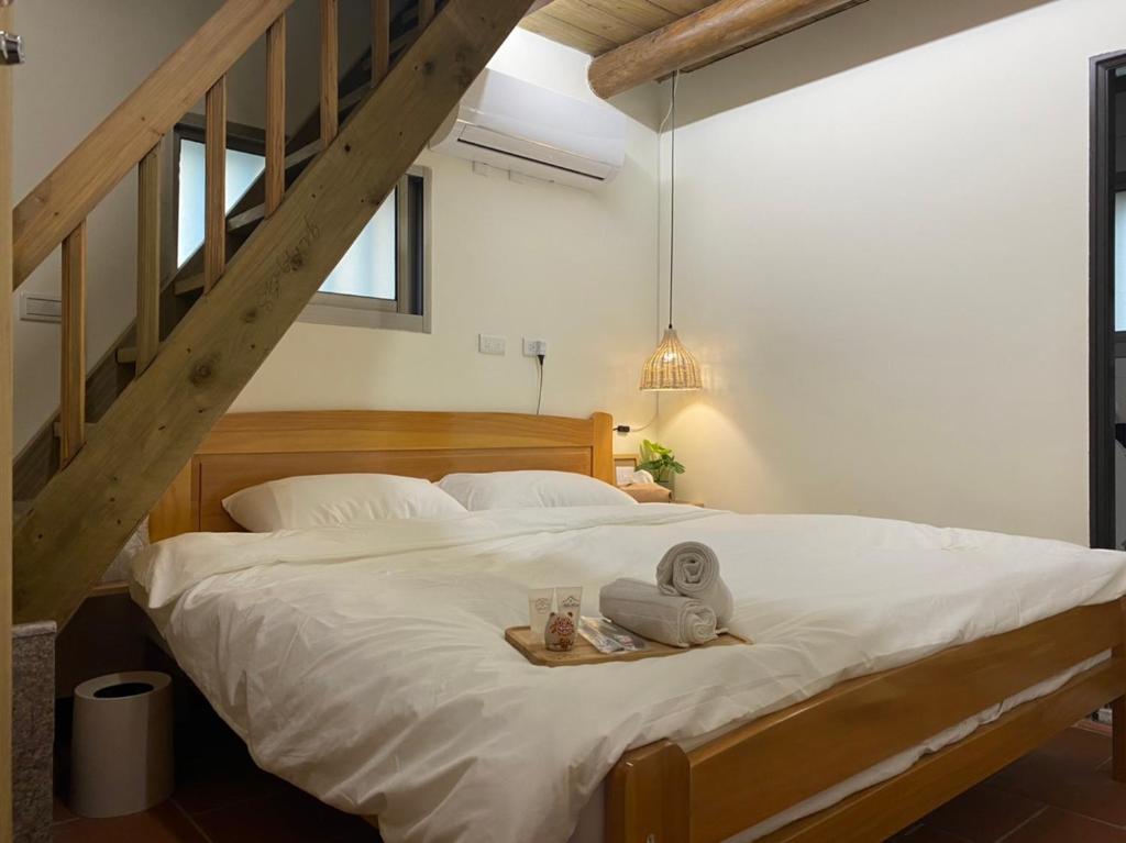 Voodi või voodid majutusasutuse 浯島 拾午15Home toas
