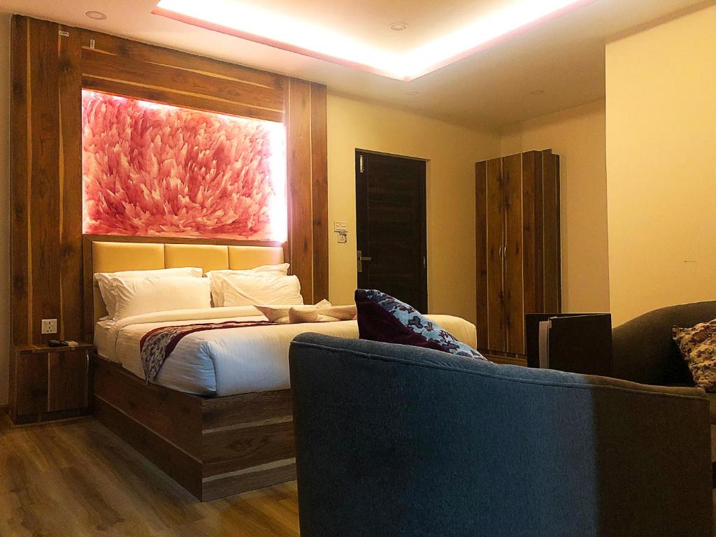 Cama ou camas em um quarto em Hotel Attic Empire