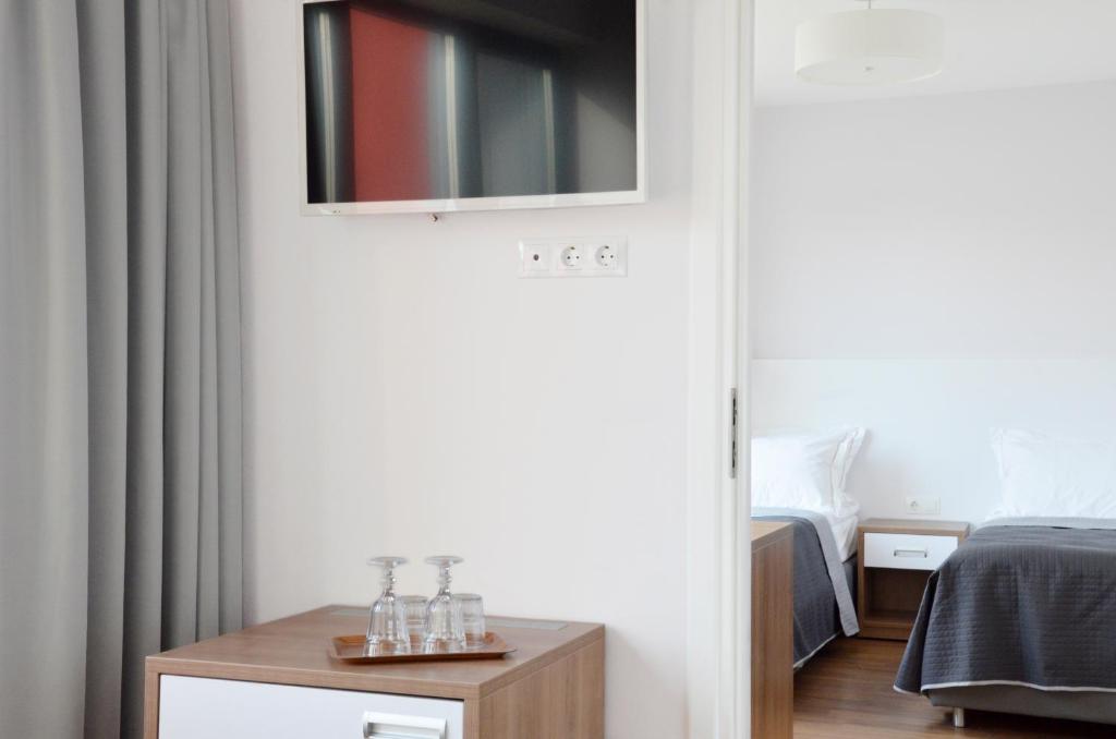 Postel nebo postele na pokoji v ubytování Tip Tap Guest House