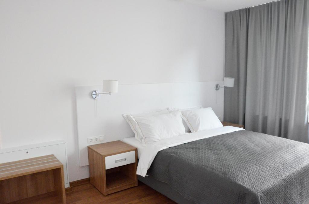 Postel nebo postele na pokoji v ubytování Tip Tap Guest House