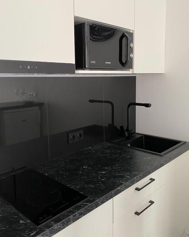 Kuchyň nebo kuchyňský kout v ubytování NEW modern apartment