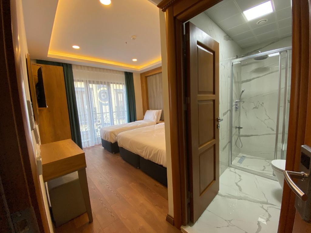 Koupelna v ubytování Pege Hotel