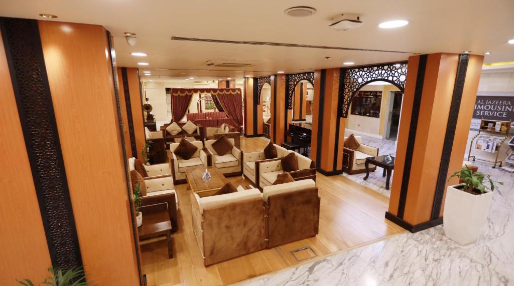 a salon with couches and a waiting room at Ras Al Khaimah Hotel in Ras al Khaimah