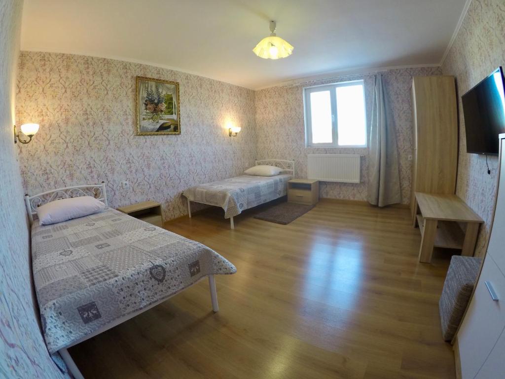 Postel nebo postele na pokoji v ubytování Бутік-отель "Lavanda"
