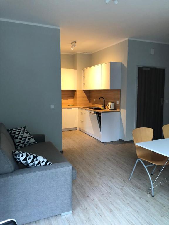 Kuchyňa alebo kuchynka v ubytovaní Baltic Blue Apartamenty Pobierowo
