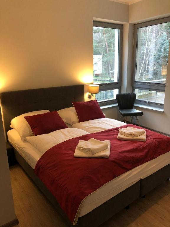Posteľ alebo postele v izbe v ubytovaní Baltic Blue Apartamenty Pobierowo