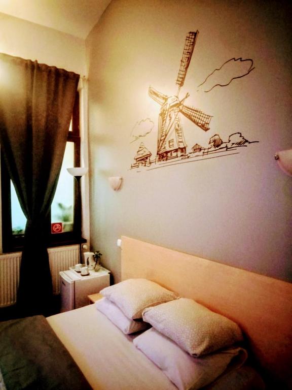 Postel nebo postele na pokoji v ubytování Central Guesthouse