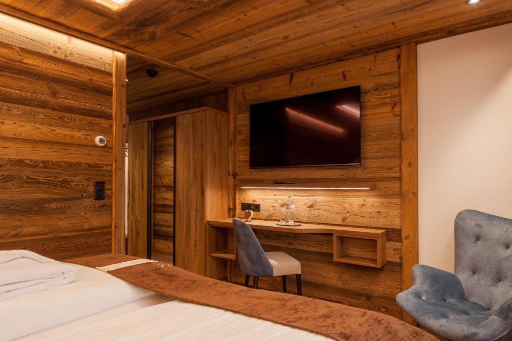 TV a/nebo společenská místnost v ubytování Silvana Mountain Hotel
