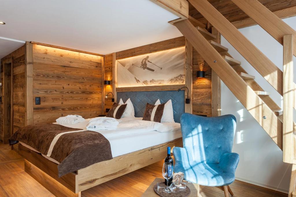 Postel nebo postele na pokoji v ubytování Silvana Mountain Hotel