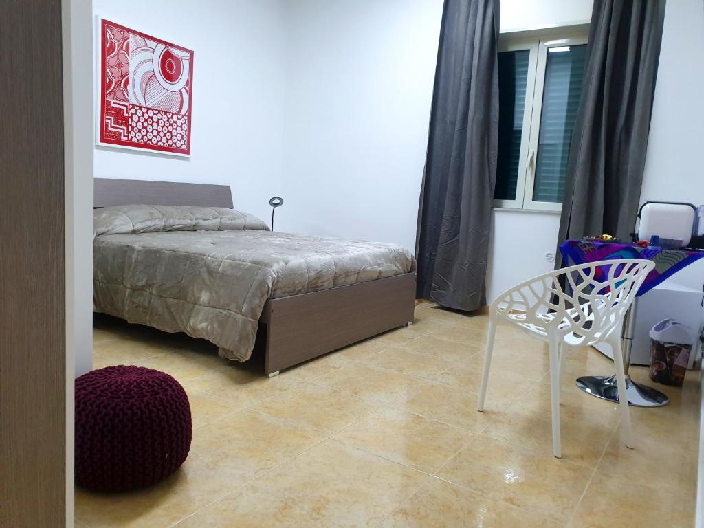 Postel nebo postele na pokoji v ubytování B&B HERCULANEUM RUINS