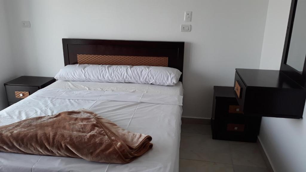 Postel nebo postele na pokoji v ubytování Hofni Palace Nile Niew