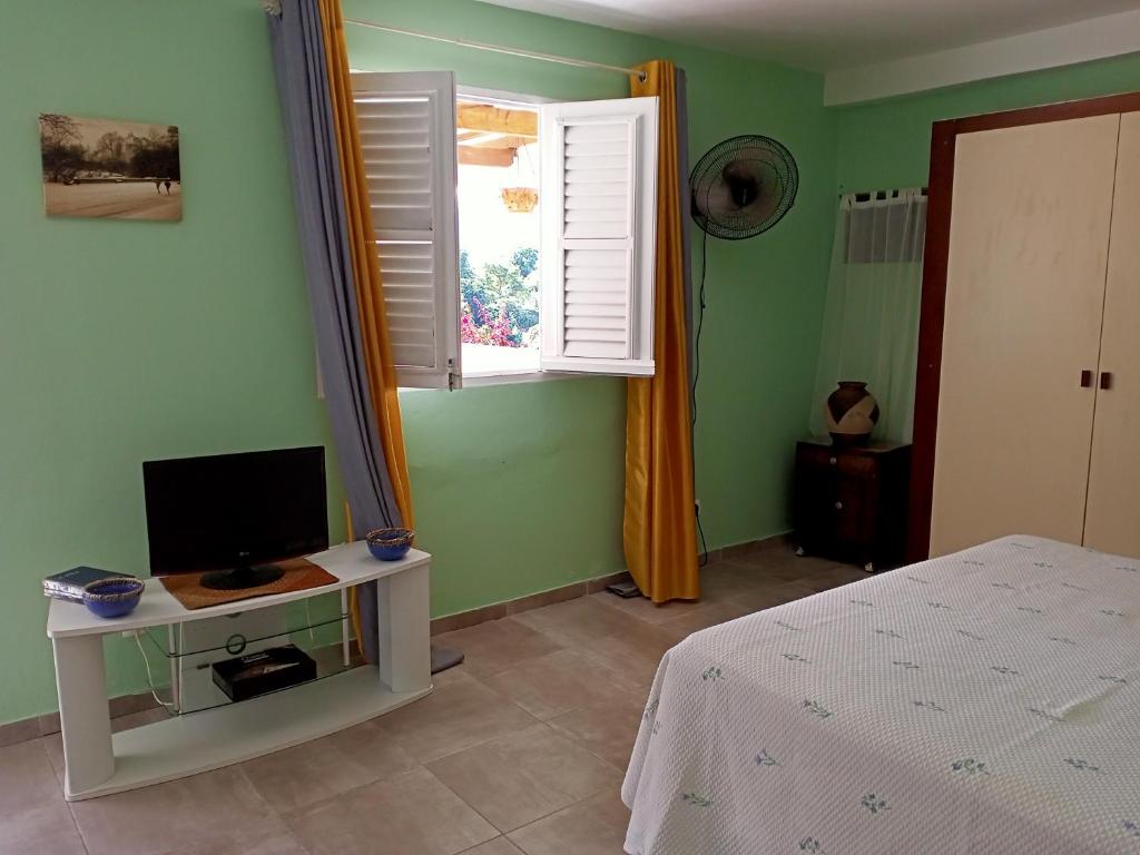 TV a/nebo společenská místnost v ubytování Paradis Caché - Confort Terrasse - Kybo Karaib Location - pkg - Mtgne