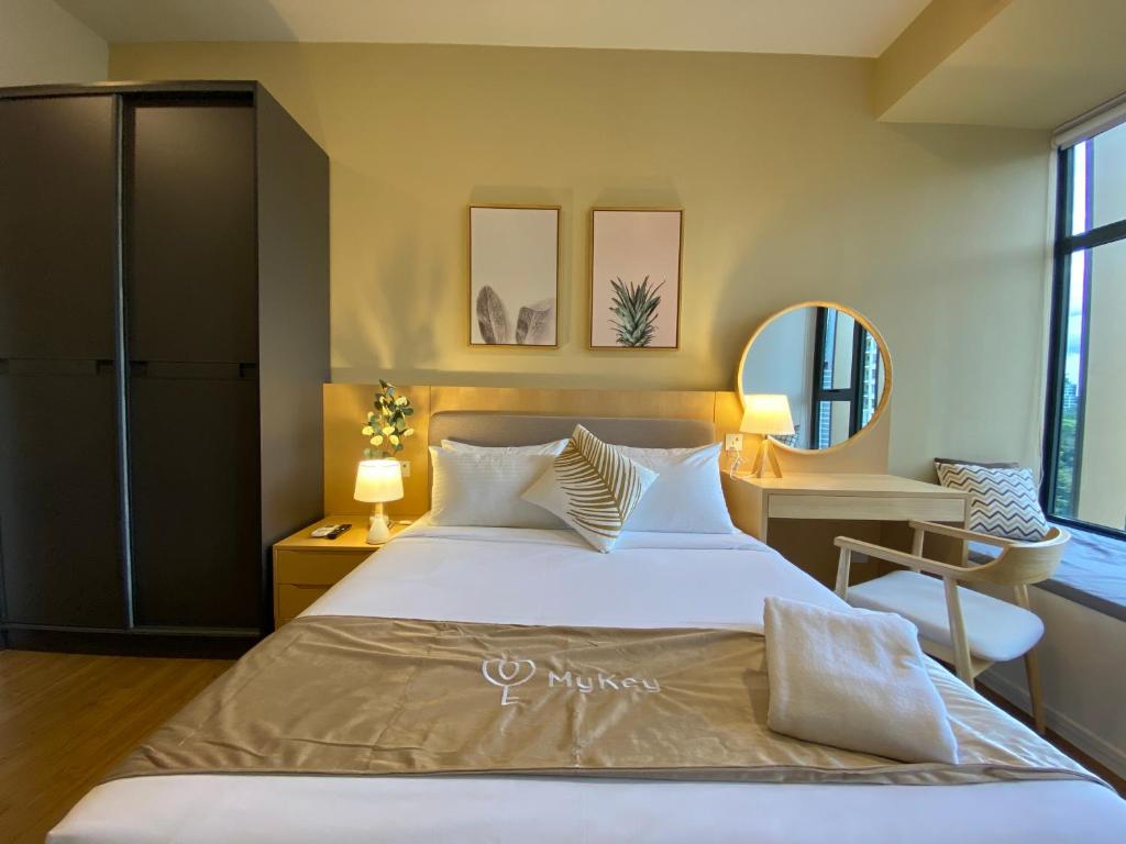 Voodi või voodid majutusasutuse Ceylonz Suites by MyKey toas