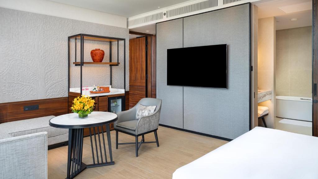 Postel nebo postele na pokoji v ubytování Hyatt Regency Phnom Penh
