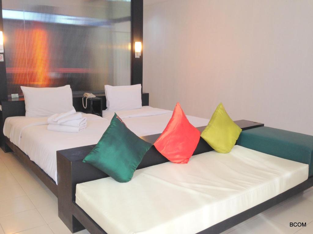 Postel nebo postele na pokoji v ubytování Khun Chaweng Resort
