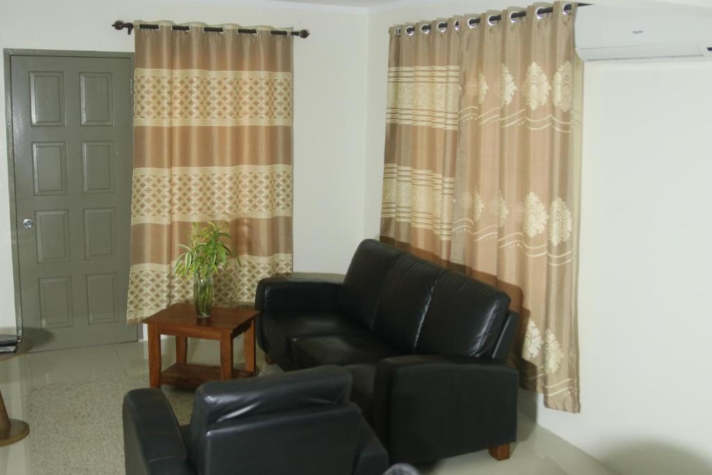 Posezení v ubytování FIJI HOME Apartment Hotel
