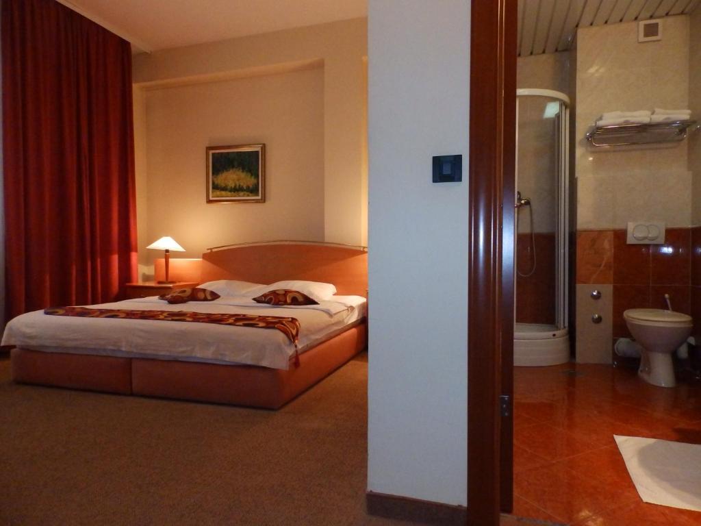 Postel nebo postele na pokoji v ubytování Hotel N